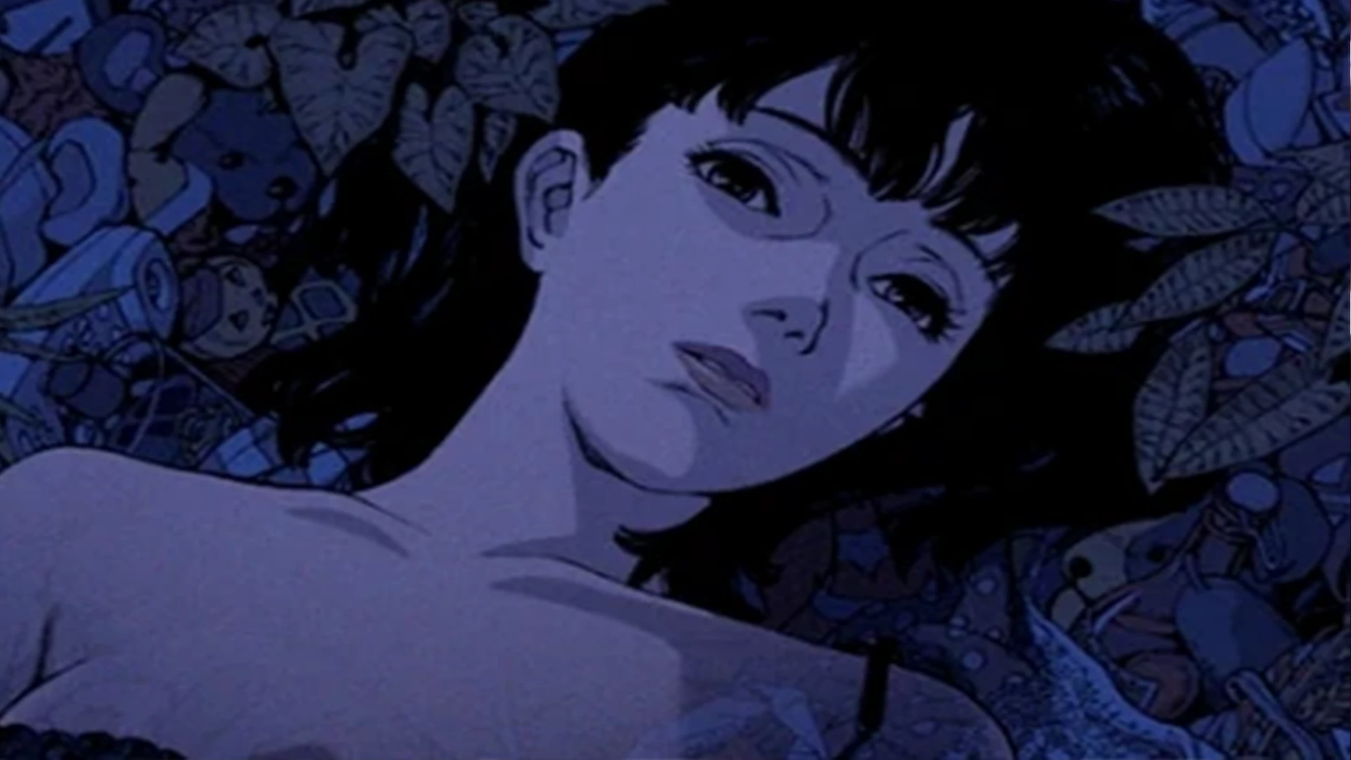 A collage of scenes from Satoshi Kon's films like Perfect Blue and Paprika.